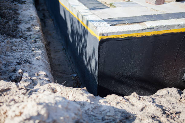 Professional Waterproofing technician working in Peninsula, OH